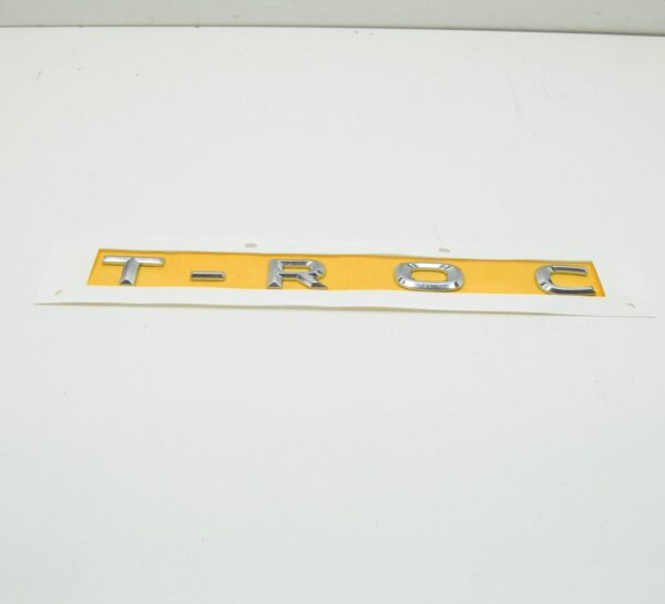 NEW VW T-ROC A1 REAR TRUNK LID INSCRIPTION 2GA853687A 2ZZ 2GA853687A2ZZ ORIGINAL - Image 2