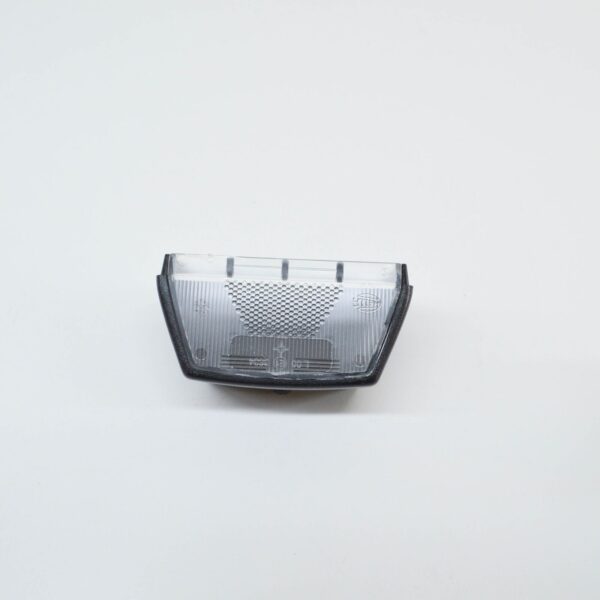NEW VOLKSWAGEN TRANSPORTER T5 NUMBER PLATE LIGHT HOLDER TRIM 7F0943111 ORIGINAL - Image 2