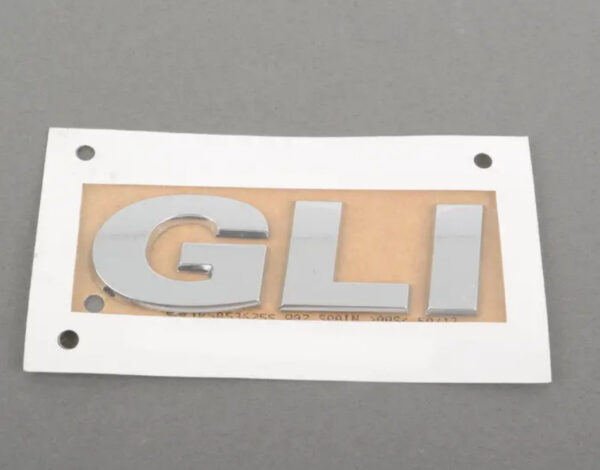 NEW VOLKSWAGEN JETTA A6 MK6 REAR LID BADGE 1K5853675S739 ORIGINAL - Image 2