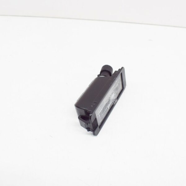 NEW VOLKSWAGEN FOX LICENSE PLATE LIGHT 1JE943021A ORIGINAL - Image 3