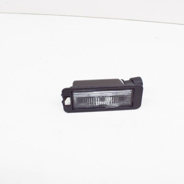 NEW VOLKSWAGEN FOX LICENSE PLATE LIGHT 1JE943021A ORIGINAL - Image 6